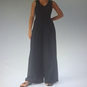 LARGE.   HALARA SOFTLY ZERO V NECK WIDE LEG FLOWY JUMPSUIT
